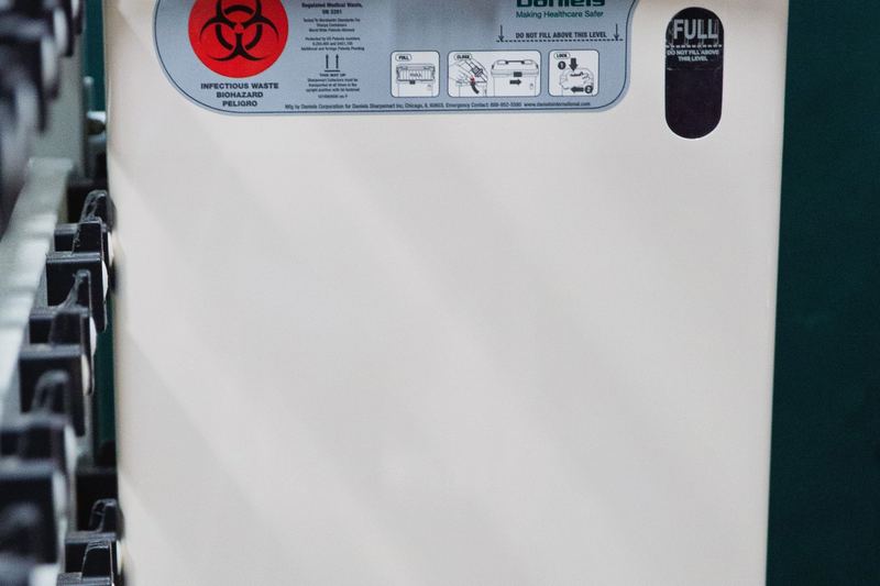 Professional sharps waste container