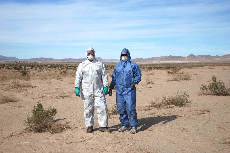 Protective Tyvek coveralls hanging ready for use